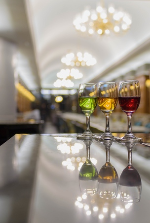 Three cocktails on the bar counter and Blured background,restaurantの写真素材