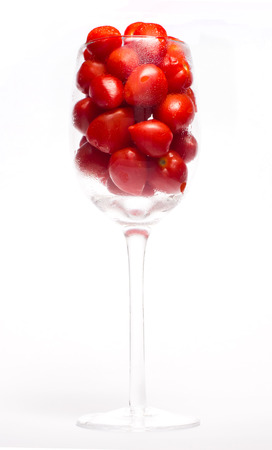 Red Tomato in Wine Glassの写真素材