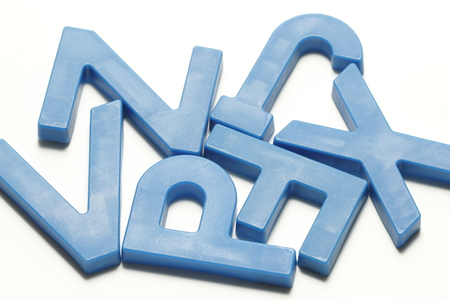 Blue Plastic Magnetic Alphabet on White backgroundの写真素材