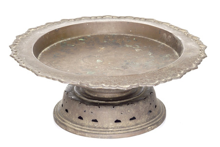 Old Brass tray with pedestal in White backgroundの写真素材