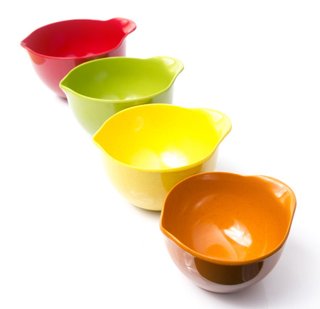 Colorful measuring cup in White backgroundの写真素材