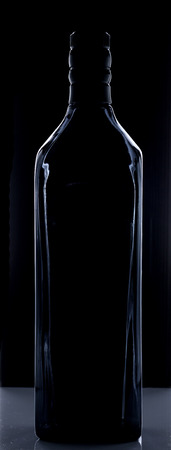 Black Bottle in Black backgroundの写真素材