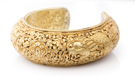 Carve Golden Bangle in White backgroundの写真素材
