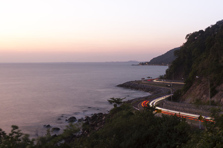 Shape Curve Road with Sea in Evening Skyの写真素材