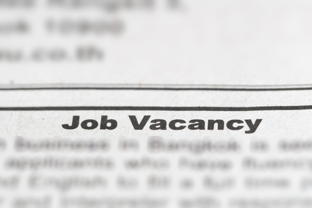 Job Vacancy on News Paper with Blur Around