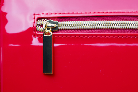 Gold Zipper of Red Purseの写真素材