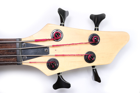 Head of Electric Bass Guitar close up shot with White background