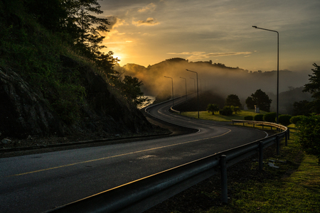 S Curve Road in Morning with Mountain and mistの写真素材