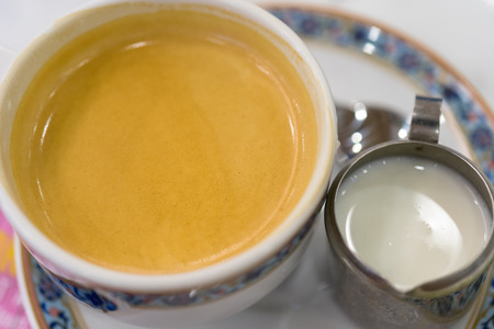 espresso hot coffee closeup from top with creamの写真素材