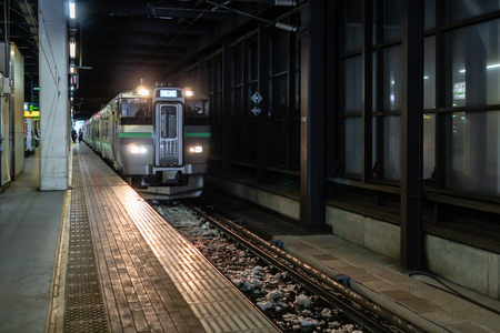 Sapporo, Japan - Jan 28, 2019 : Local Train of Hakodate Line parking at platform of Sapporo Train Station of Hokkaido, Japanのeditorial素材