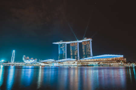 Office building of Singapore at night nearby the bayのeditorial素材