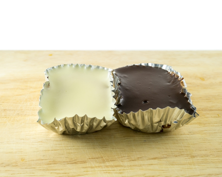 Dark  Milk chocolate moose on wooden plateの写真素材