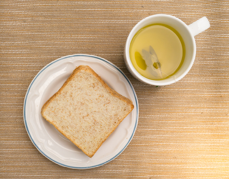 top view of green tea and bread with morning light