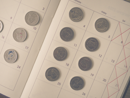 Thai Baht coin on month planner each day
