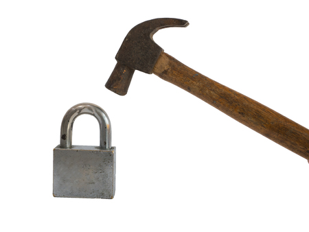 old hammer hit key lock on white background isolatedの写真素材