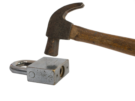 old hammer hit key lock on white background isolatedの写真素材