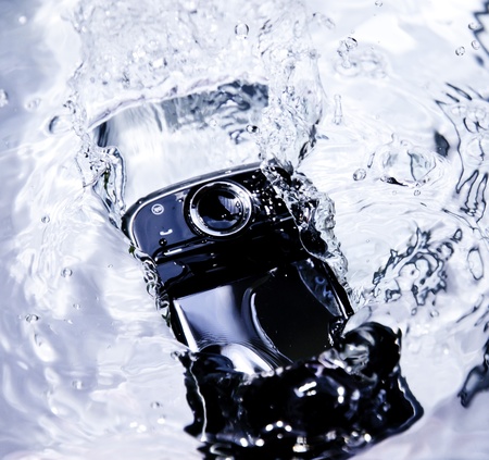 smartphone falling into the waterの写真素材