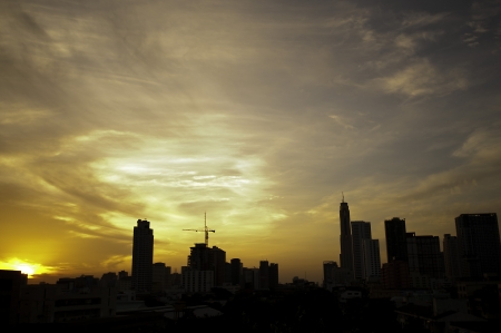 early morning sky in Bangkok with towers in silhouetteの写真素材