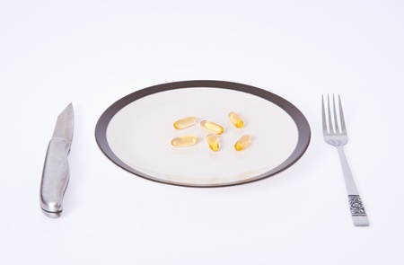 Fish Oil Capsules on the Dish