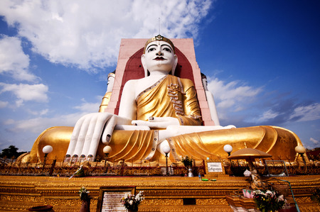 Kyaikpun Pagoda - the four seated Buddha, sitting back to back to four directions in the city of Bago, Myanmarの写真素材