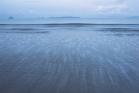 Long exposed waves in the morningの写真素材