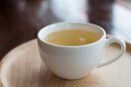 hot tea cup on tableの写真素材