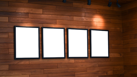 blank photo frame on wallの写真素材