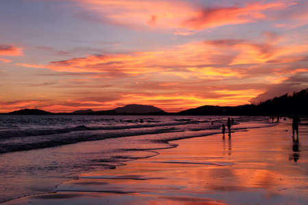 Beautiful sunset at the beach in Rio de Janeiro, Brazil.の写真素材