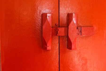 Red lock on the red door の写真素材
