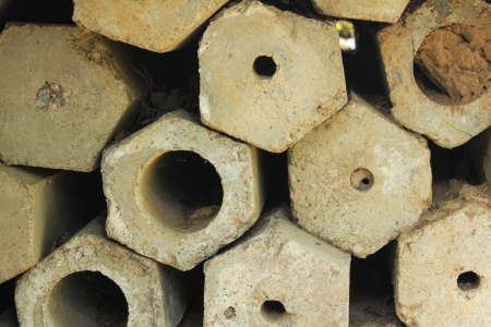 A row of Old cement polesの写真素材