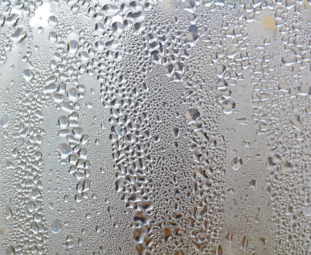 Water drops background with big and small drops