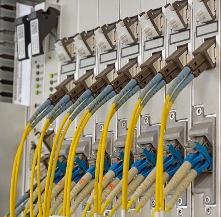 Fiber Optics with SC/LC connectors. Internet Service Provider equipment. Focus on fiber optic...