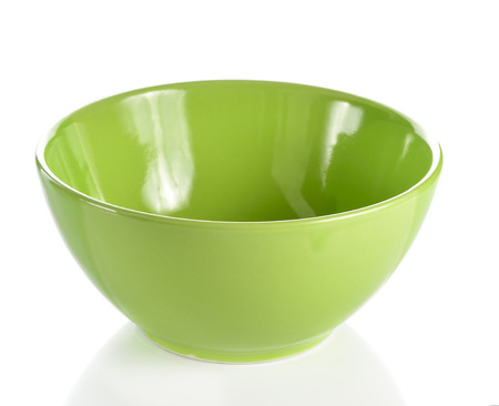 Empty green plastic bowl isolated on white backgroundの写真素材