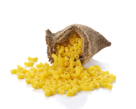 Raw Elbow Macaroni (Gomiti Pasta) Isolated on White Backgroundの写真素材