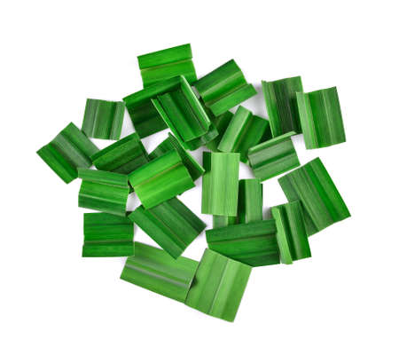 fresh green pandan leaves isolated on white background
