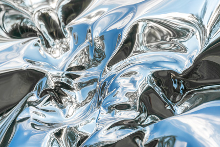 Curved abstract metallic background, textureの写真素材