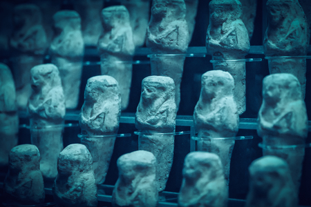Many rows of ancient stone figurines of the pharaohs, backgroundの写真素材