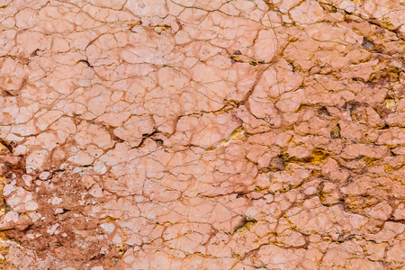 Old brown stone wall with cracks,  background, texture