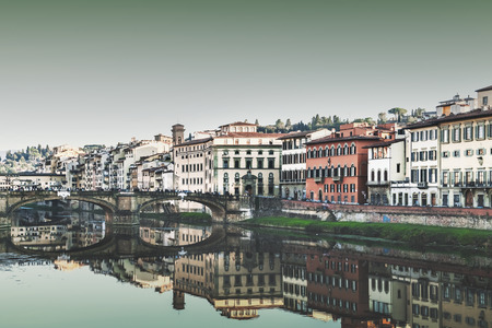 Bridge with tourists across the Arno River, Florence. Tonedの写真素材
