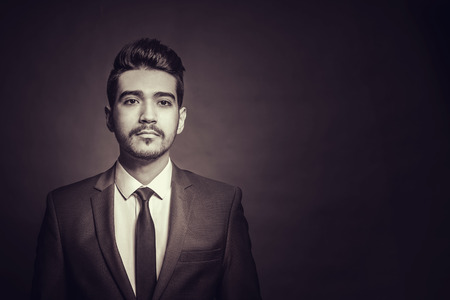 Young attractive man in a suit. Tonedの写真素材