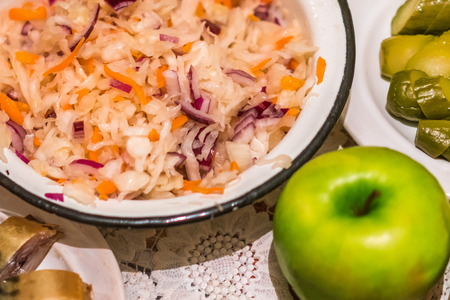 Coleslaw in metal bowl on tableの写真素材