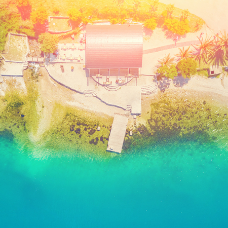 Building of a cafe on the beach in sunlightの写真素材
