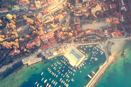 Beautiful view from the top of the city and the marina in the sunlightの写真素材