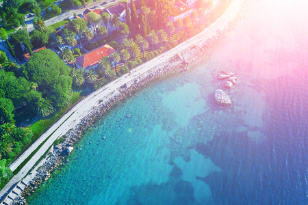 Top view of a houses by the sea in the sunlight