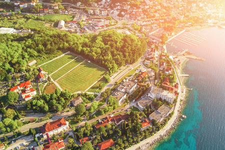 Ancient beautiful city with a monastery near the sea, top viewの写真素材