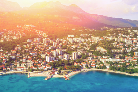 Top view of the city in the mountains by the sea, sunnyの写真素材