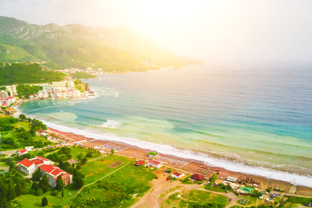 Top view of the city and beach in sunlightの写真素材