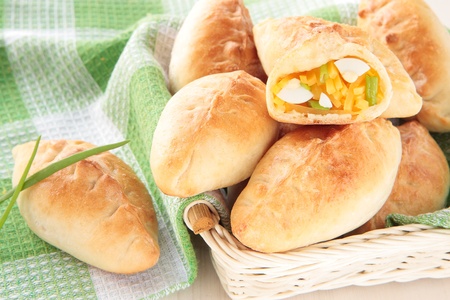 Baked patties with turnip, egg and green onionsの写真素材