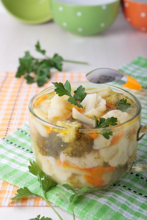 Soup of cauliflower and  broccoli  in a glass cupの写真素材