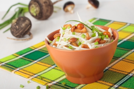Radish salad with mushrooms and green onionsの写真素材